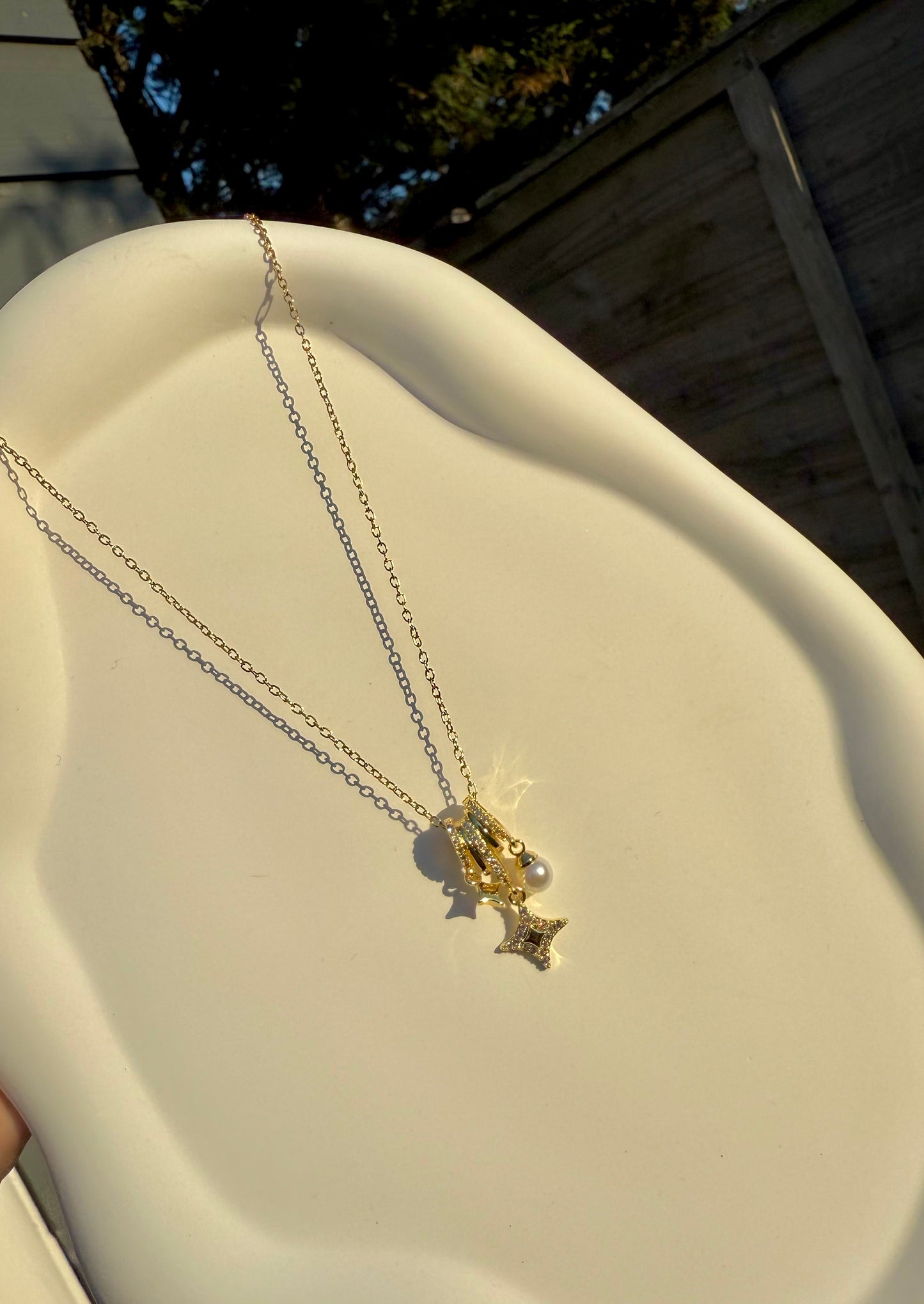Stella charm necklace